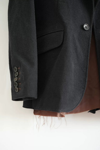 black tailored suit jacket by Sulvam