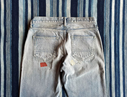 fdmtl slim fit denim distressed patchwork jeans