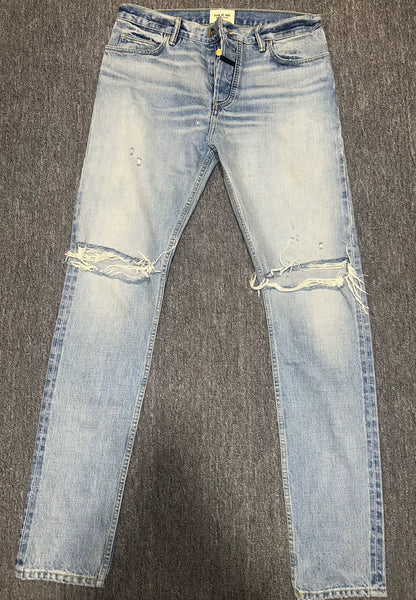 fear of god distressed denim pants