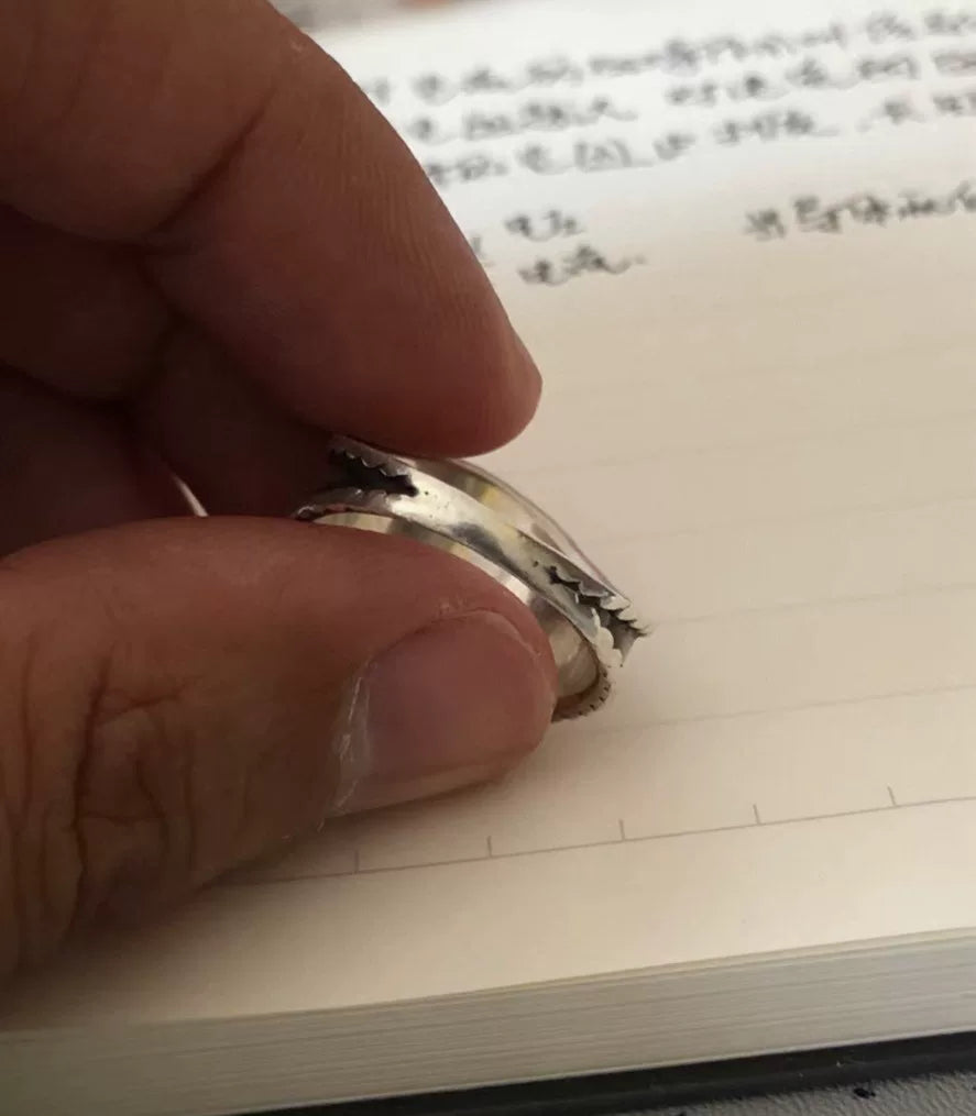 goros eagle ring with silver and gold details