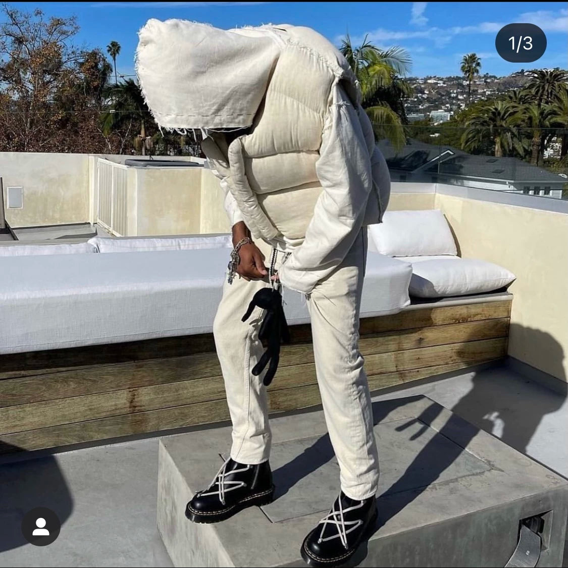 airei hand-stitched wool puffer vest