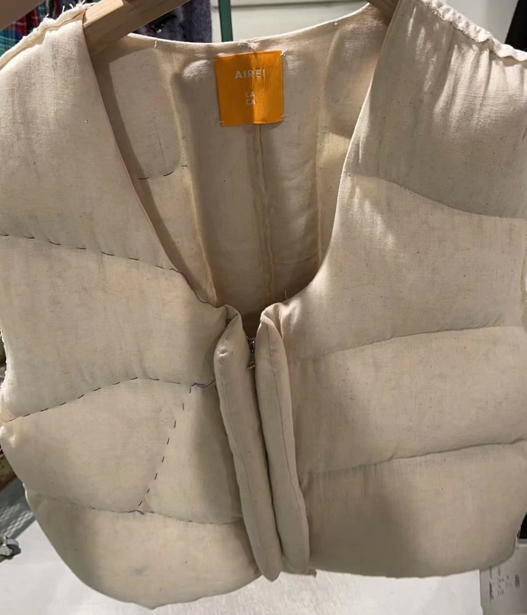 airei hand-stitched wool puffer vest