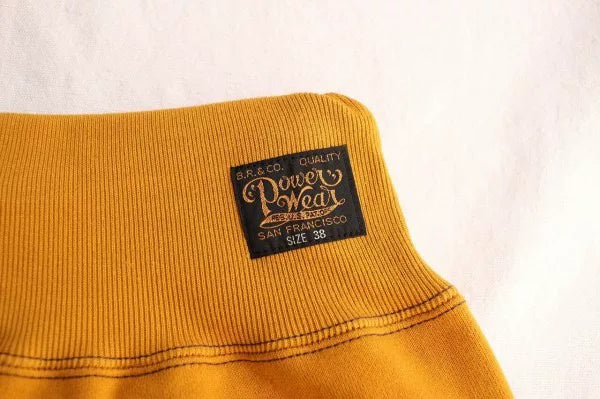 stylish yellow and brown sweatpants