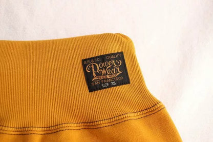 stylish yellow and brown sweatpants