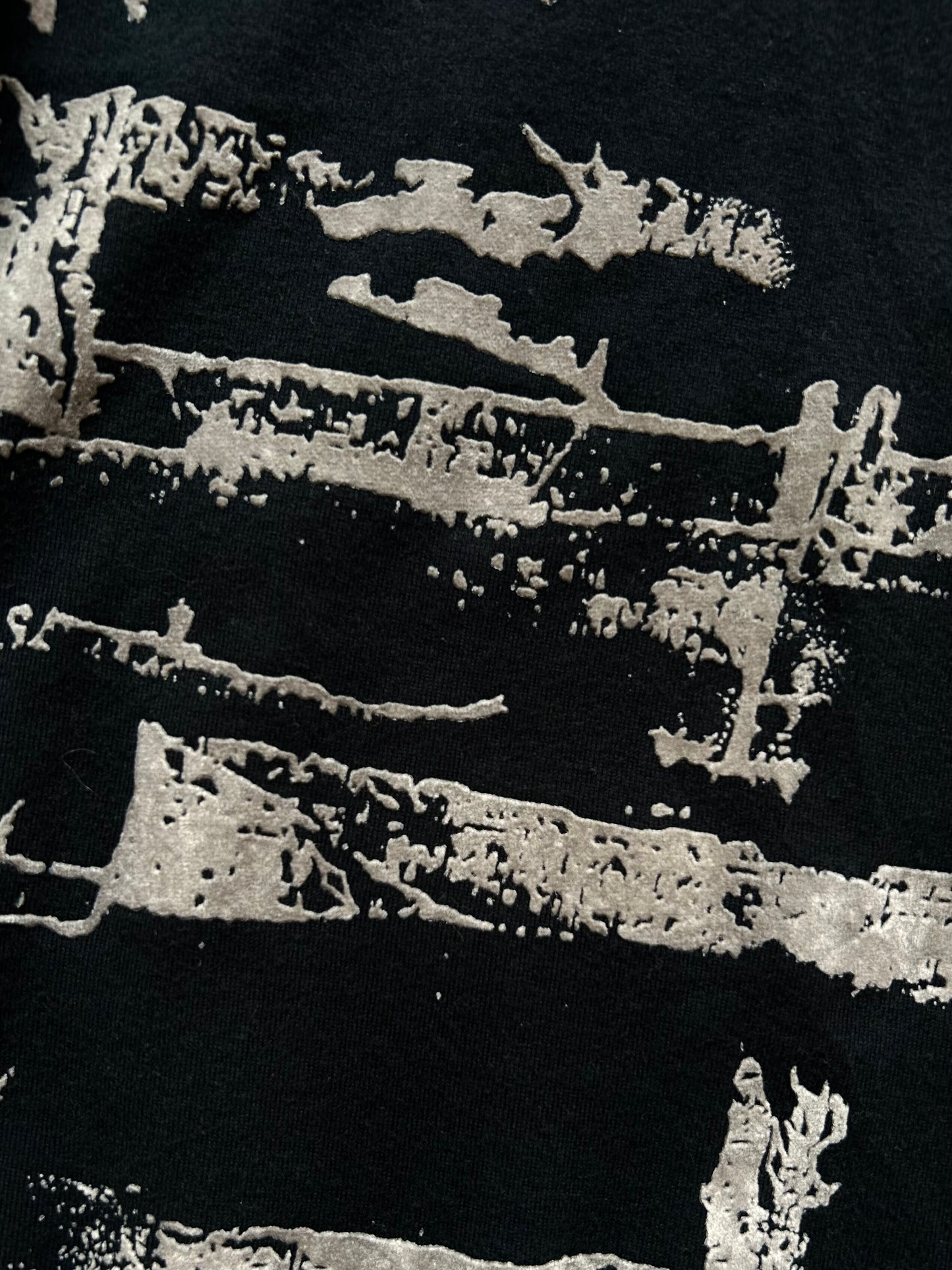 black long sleeve graphic top