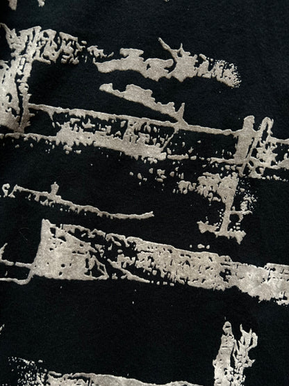 black long sleeve graphic top