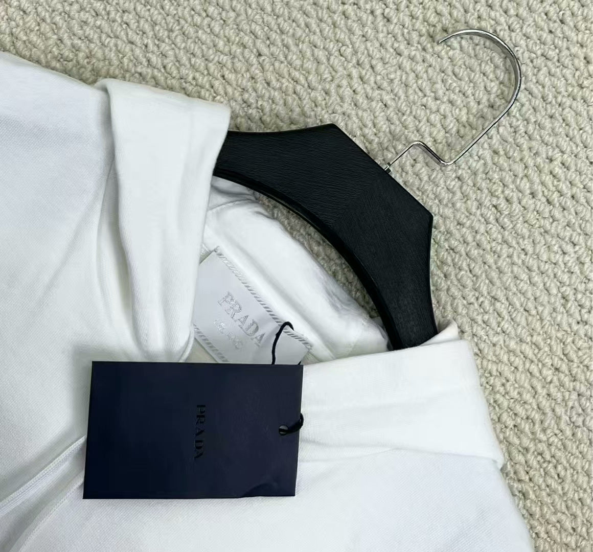 prada white logo hoodie with triangle tag