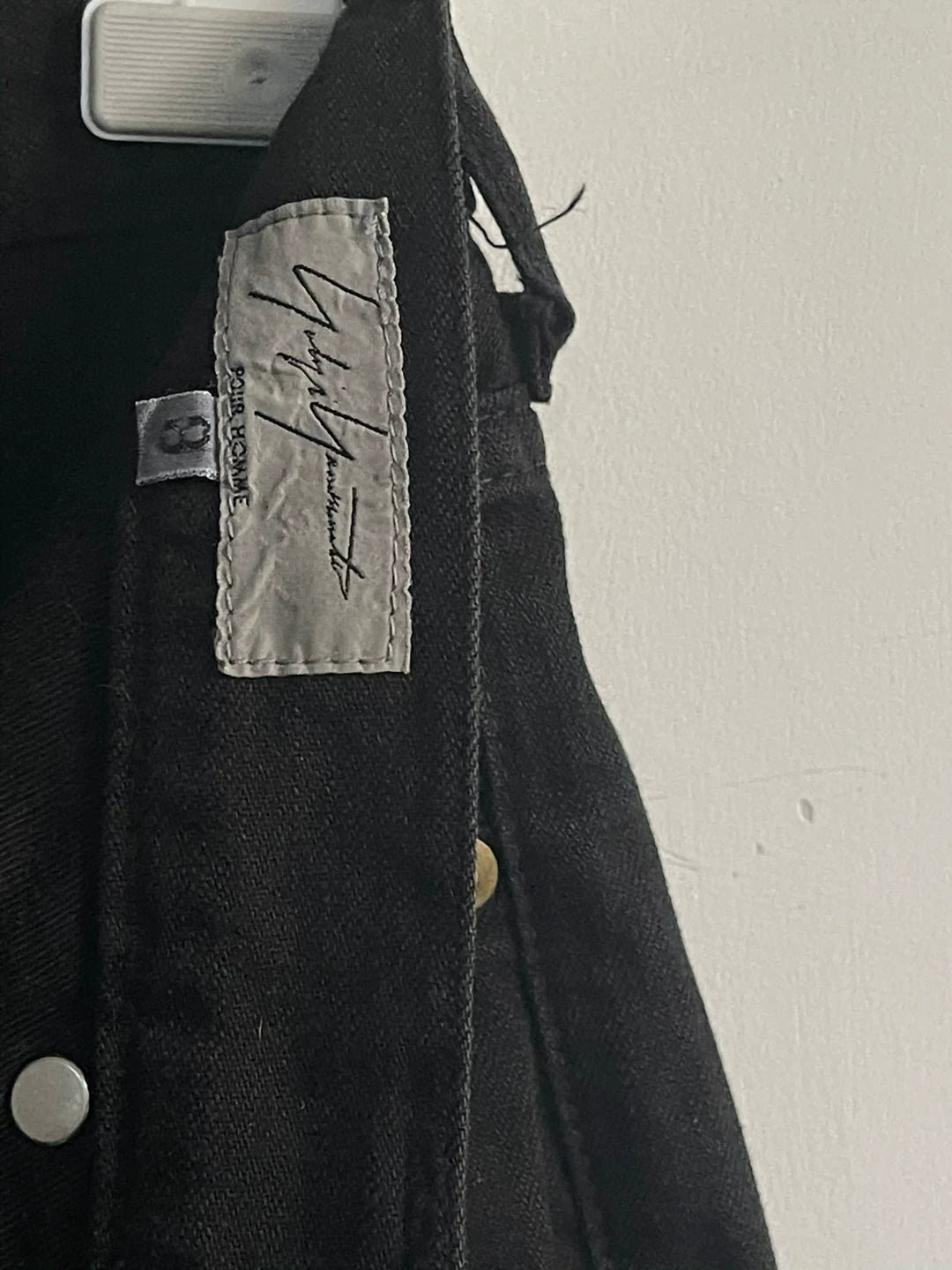 black denim pants with pocket detail