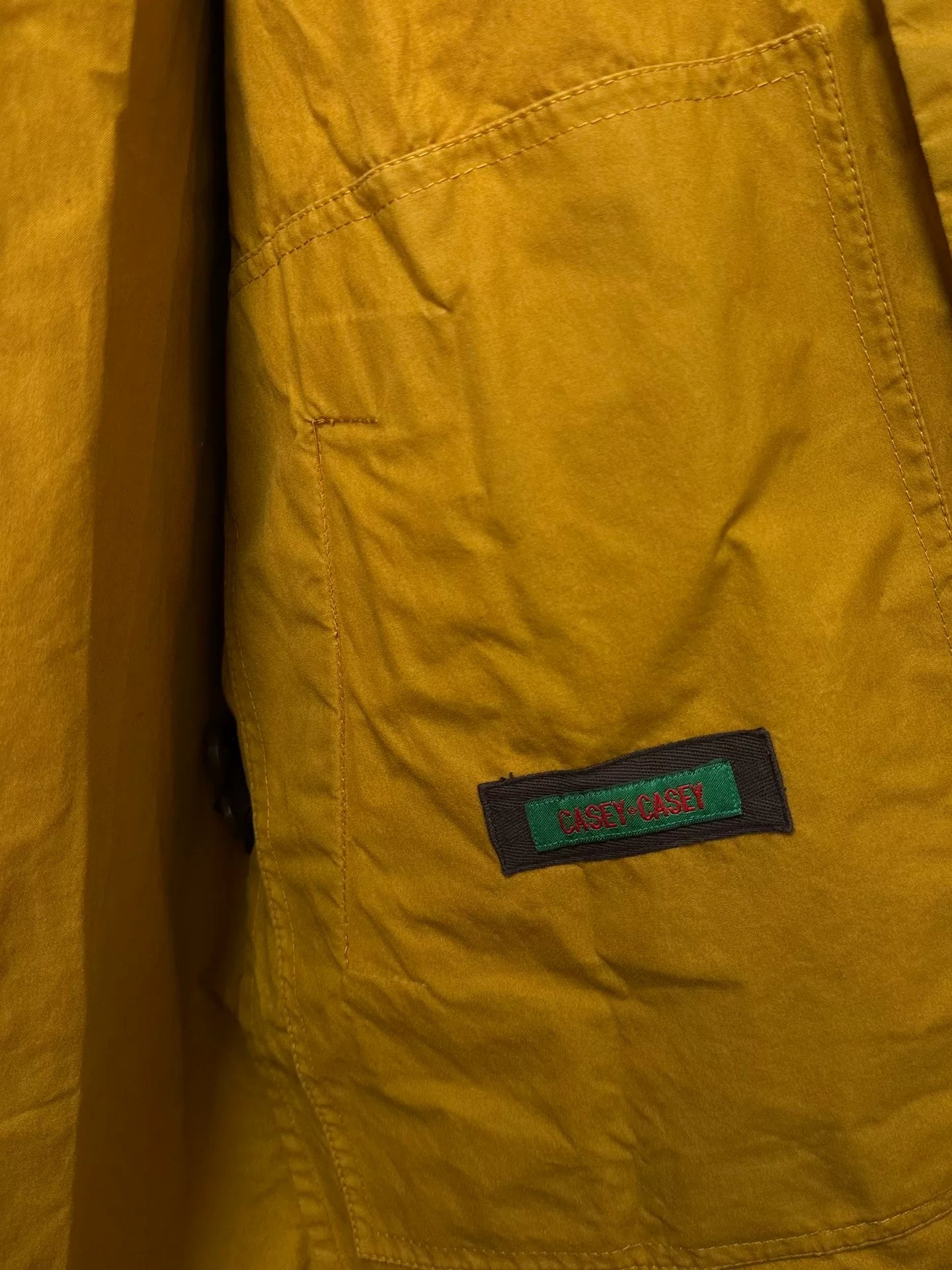 mustard yellow wax cotton hooded coat