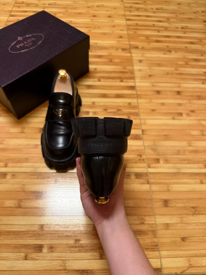 prada black leather platform shoes with logo