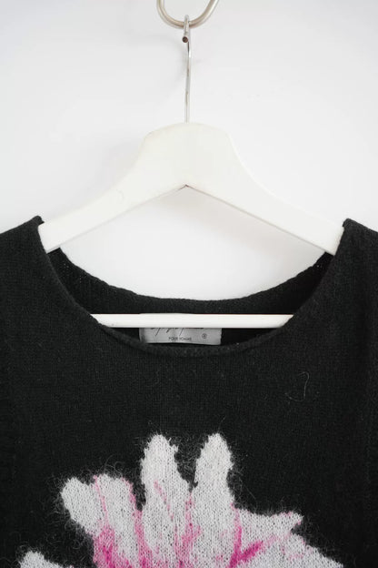 black sleeveless knit vest with floral design