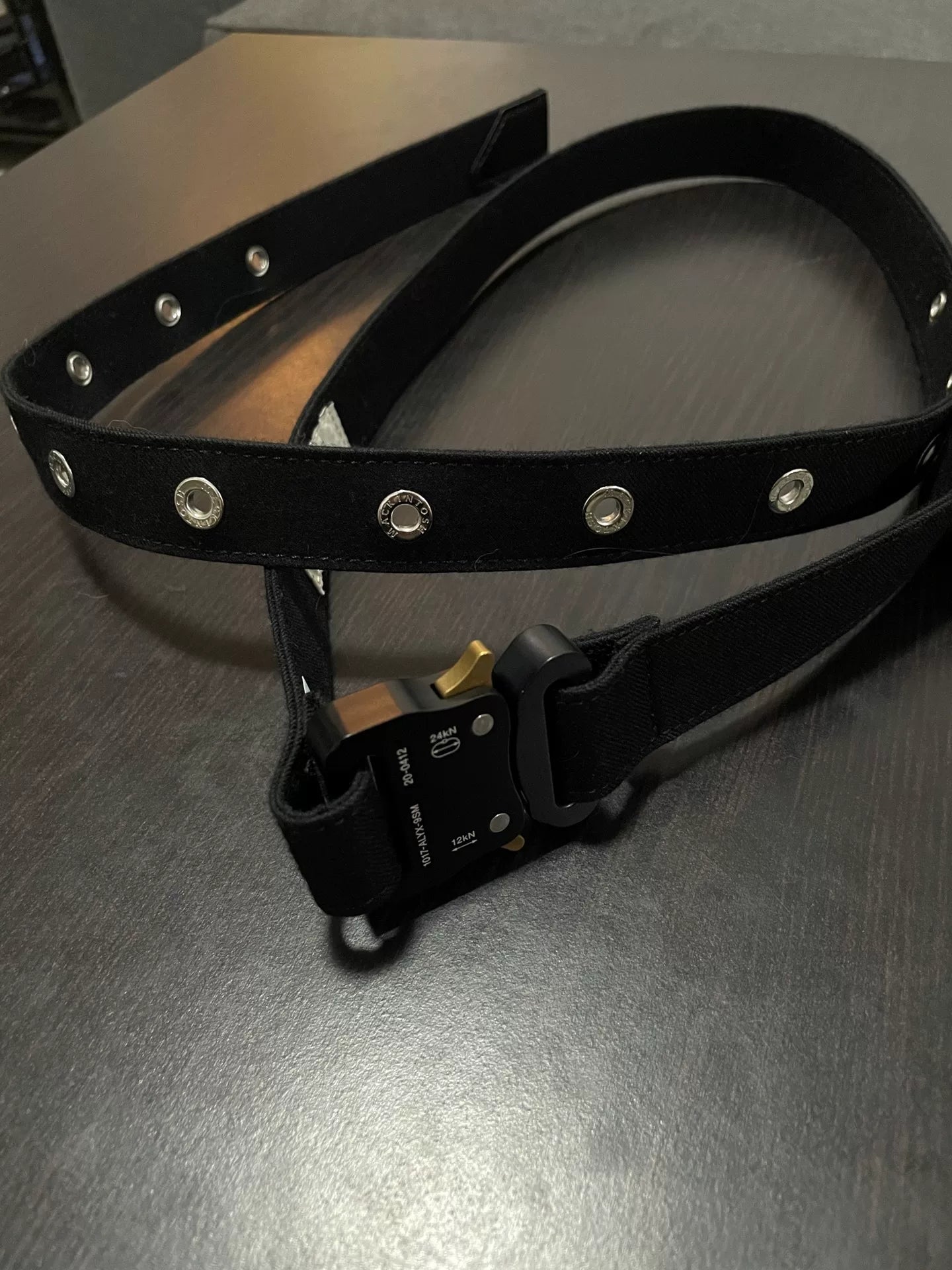 black long belt with studs and buckle