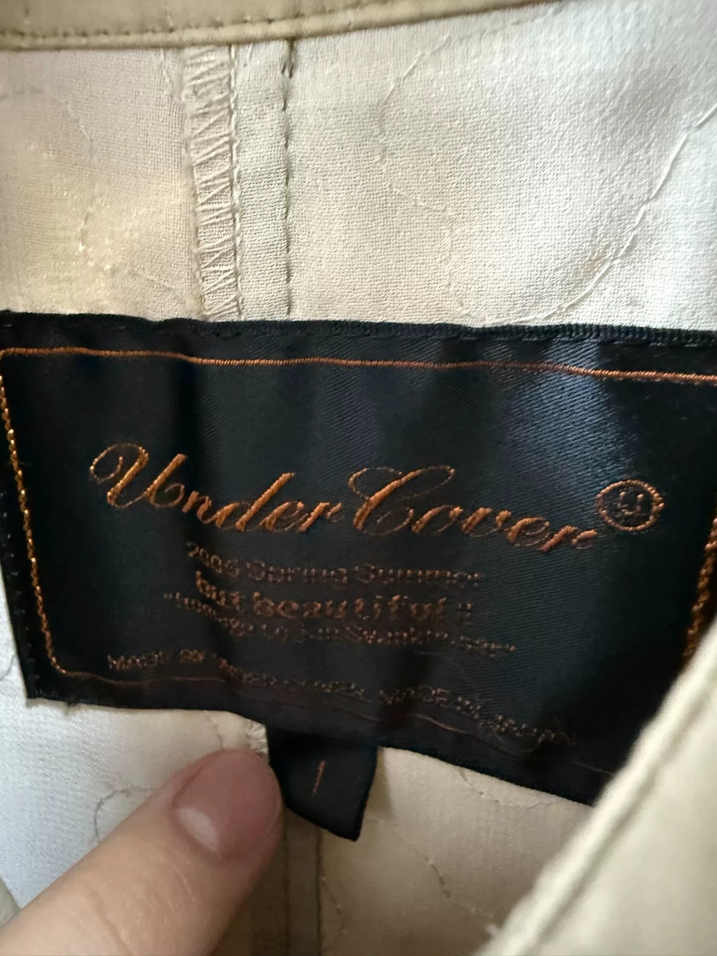 UNDERCOVER Distressed Trench Coat in Beige