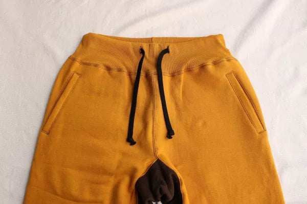 stylish yellow and brown sweatpants