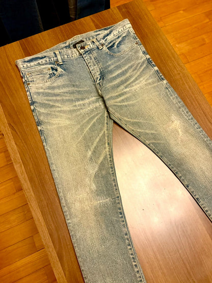 saint laurent distressed denim jeans A+