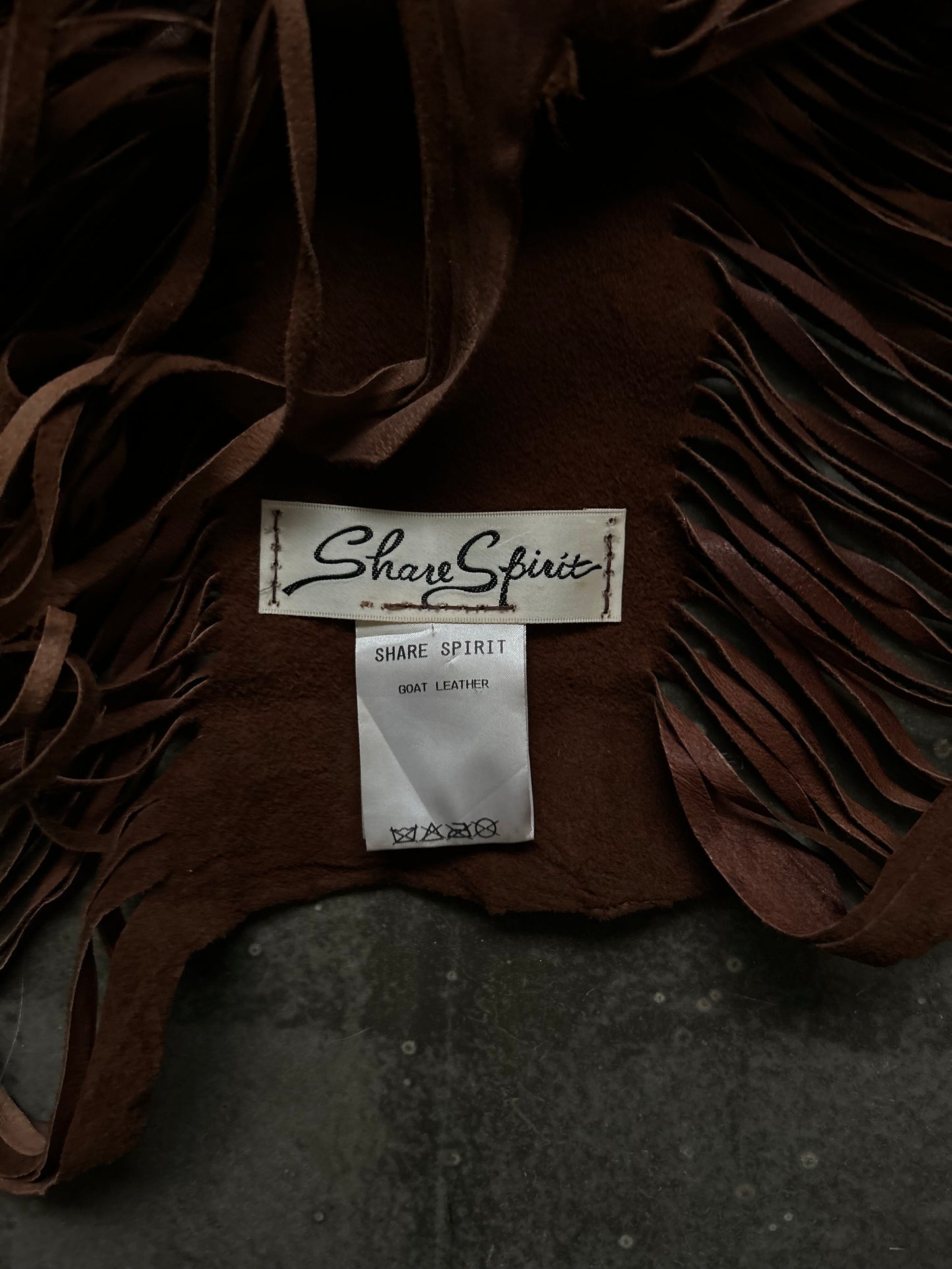 stylish brown fringed leather vest