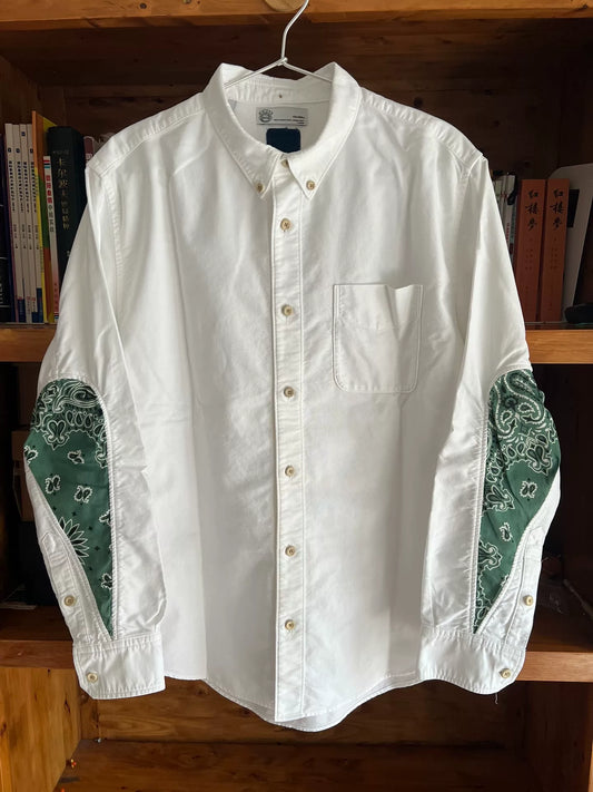 white drop sleeve shirt with paisley design