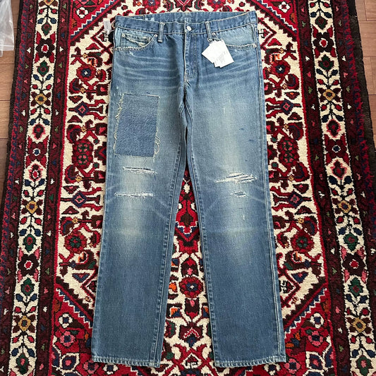visvim mud-dyed wide-leg jeans