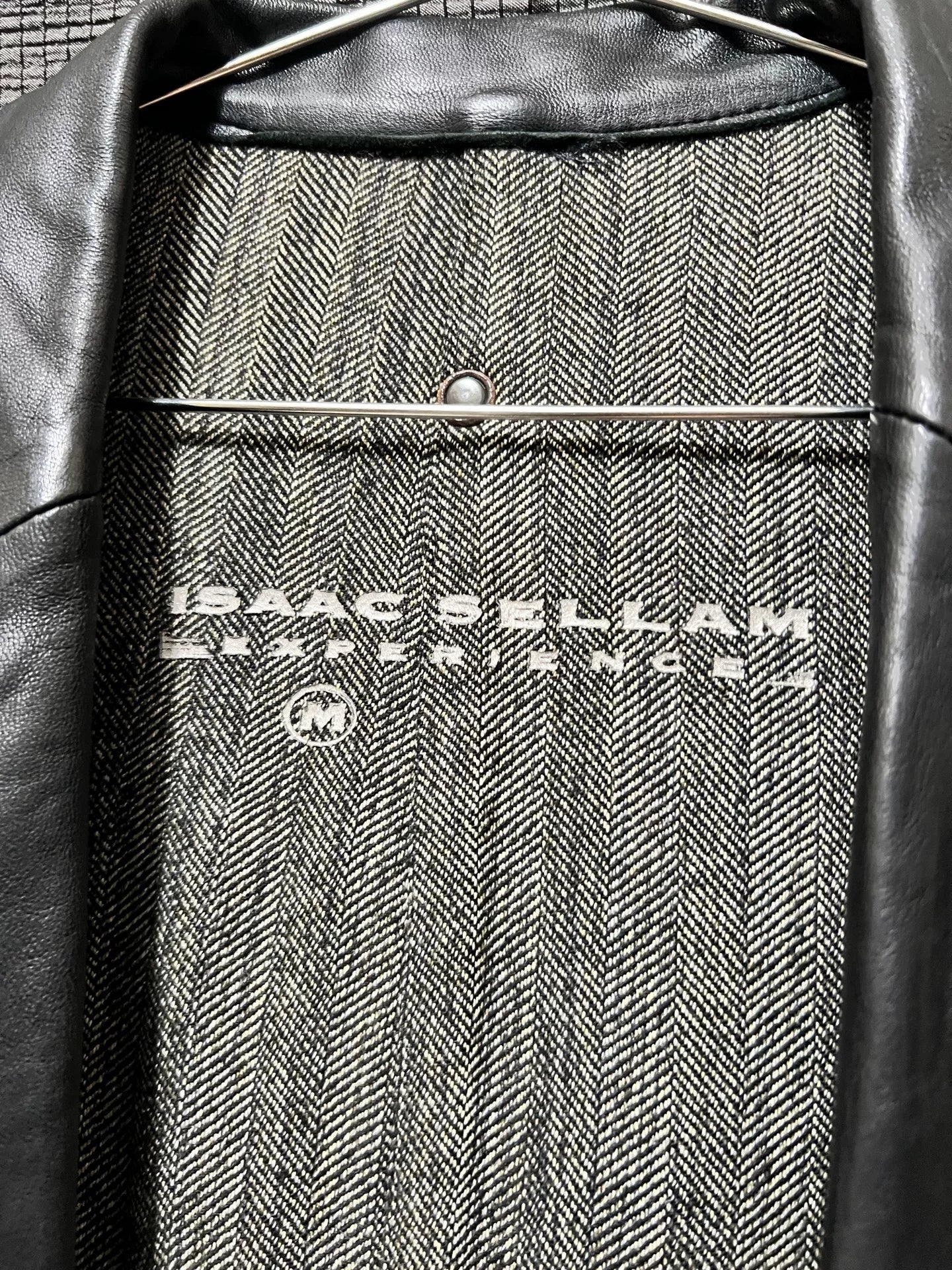dark leather overcoat by isaac sellam experience