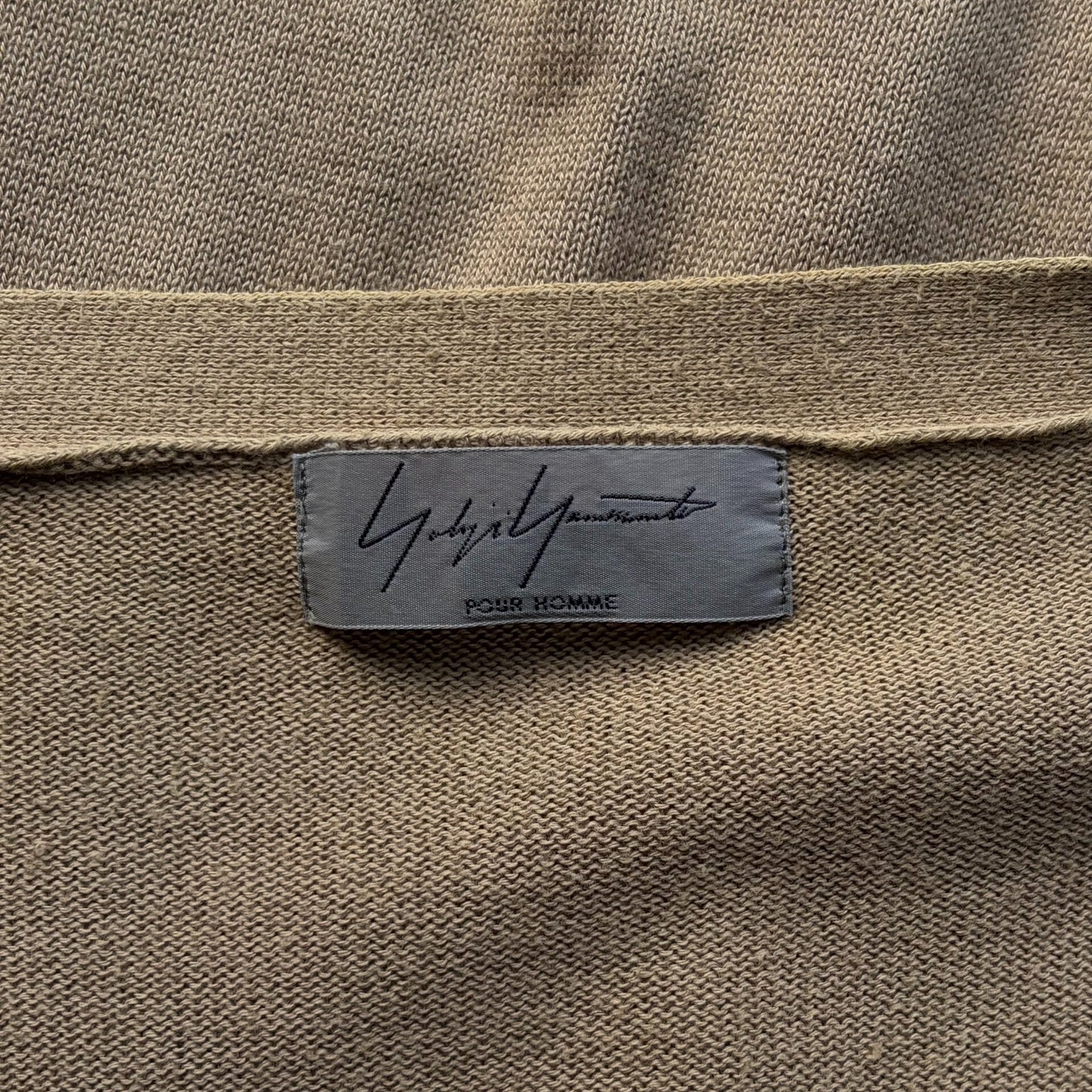 beige zip-up knitted cardigan