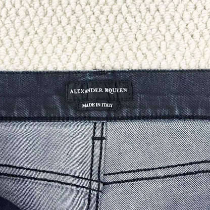 black distressed side-zip jeans by alexander mcqueen