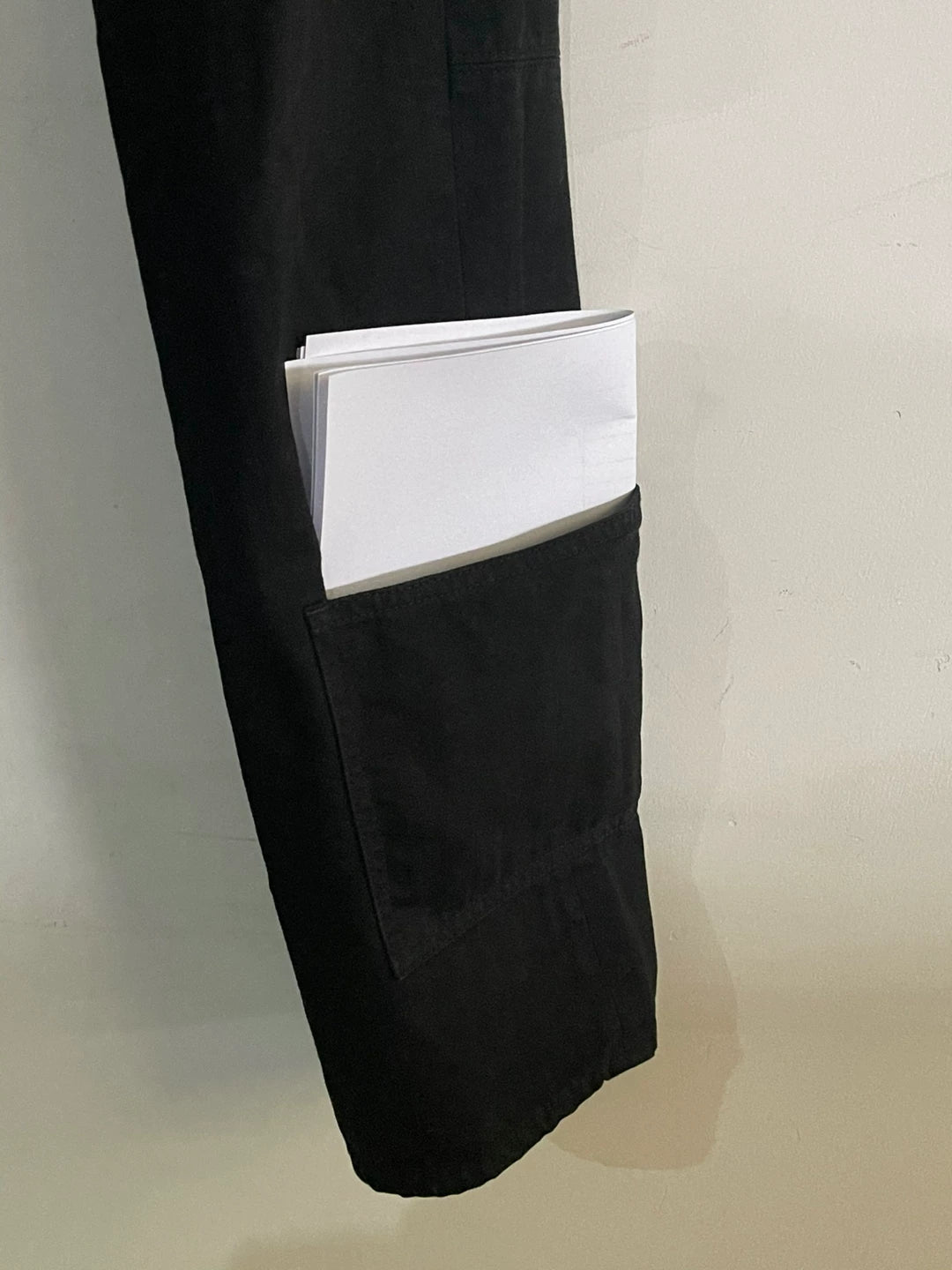 black denim pants with pocket detail