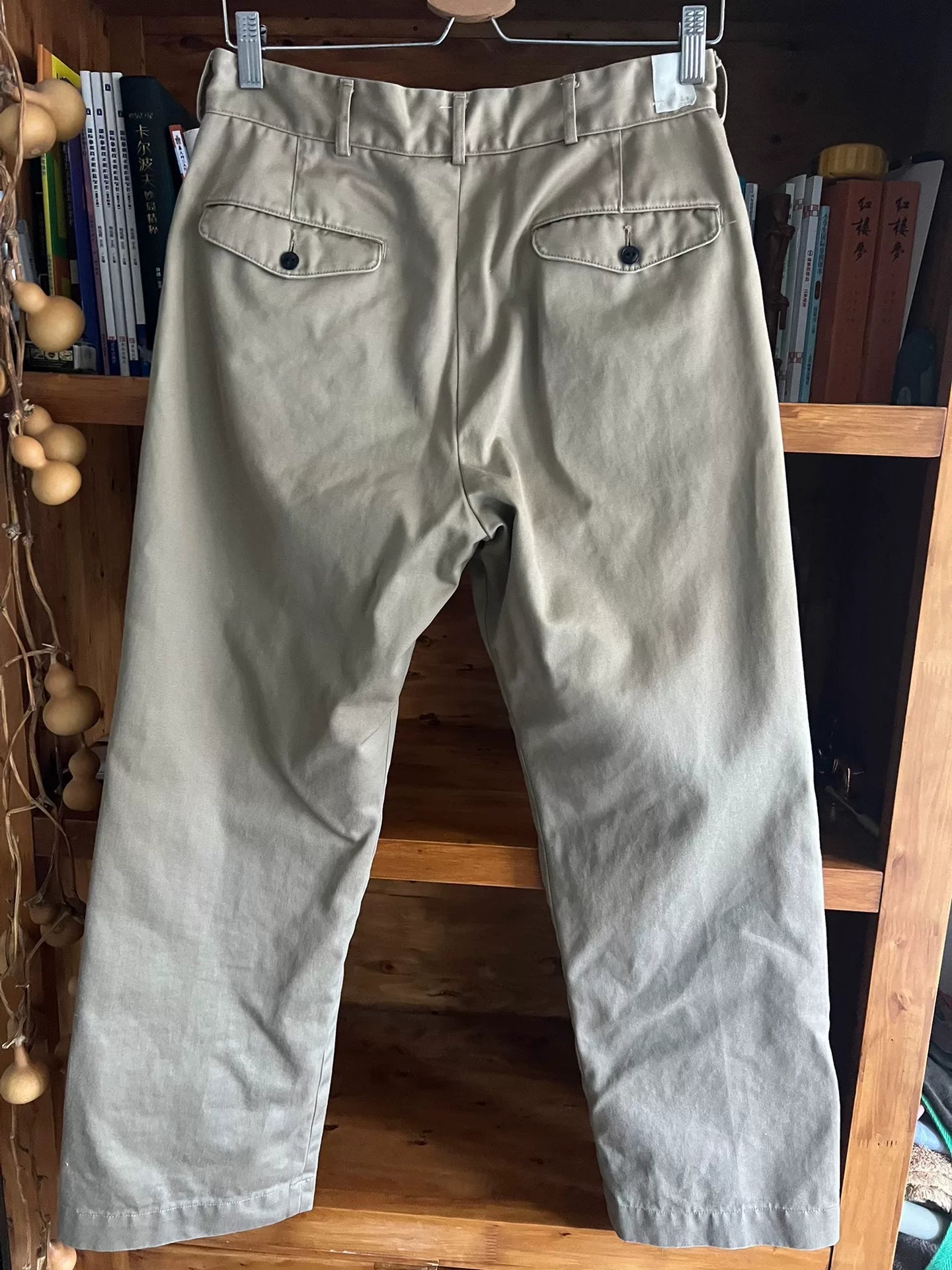 khaki pants with custom zipper details