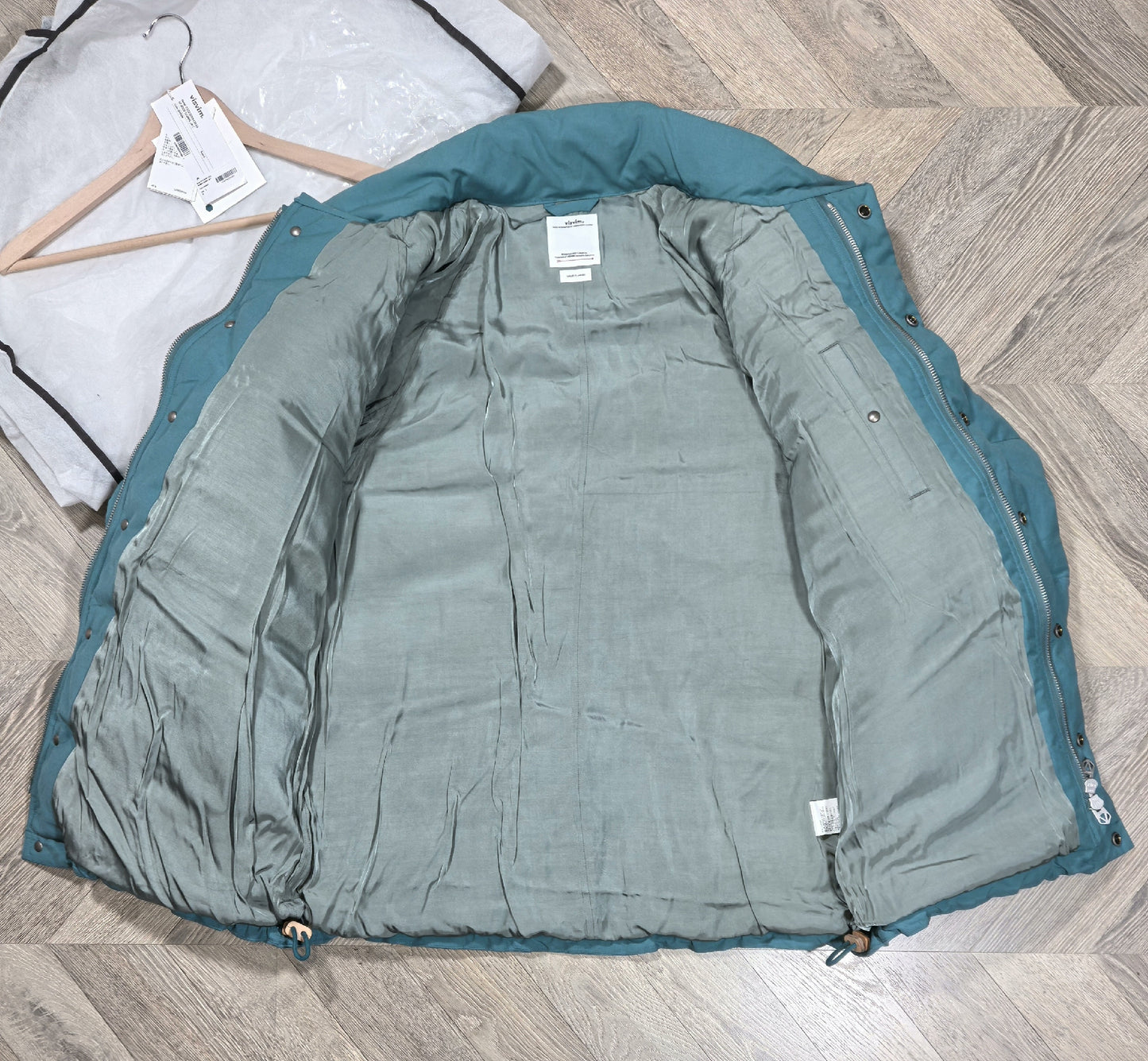 visvim ulmer down jacket in green hue