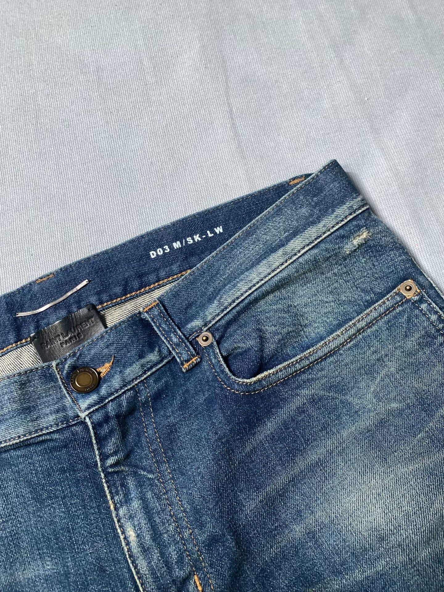 Saint Laurent Ripped Slim Low-Rise Jeans