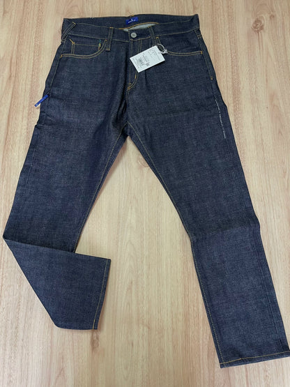 denim by vanquish green logo cropped jeans