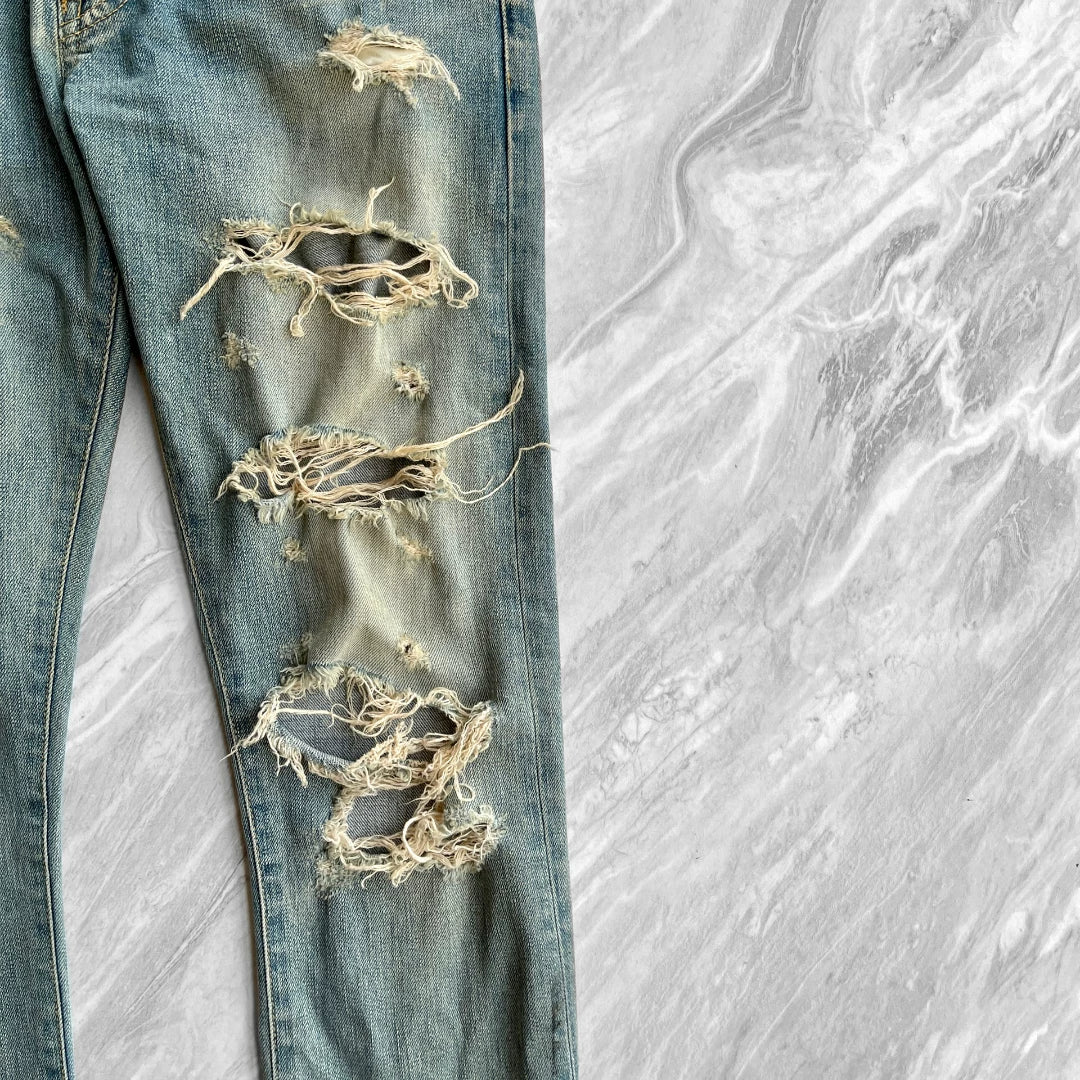 SAINT LAURENT Distressed Blue Jeans