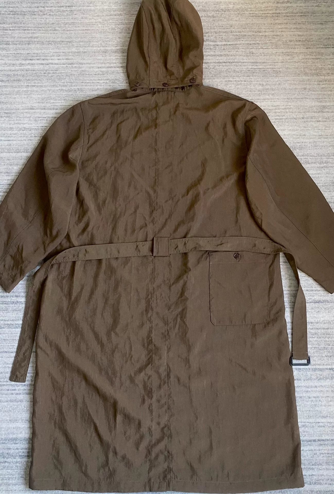 brown belted trench coat with military silhouette