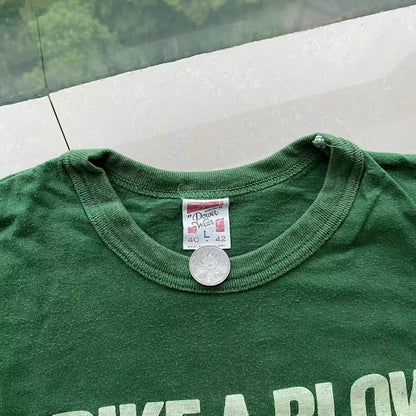 green short sleeve skull graphic tee