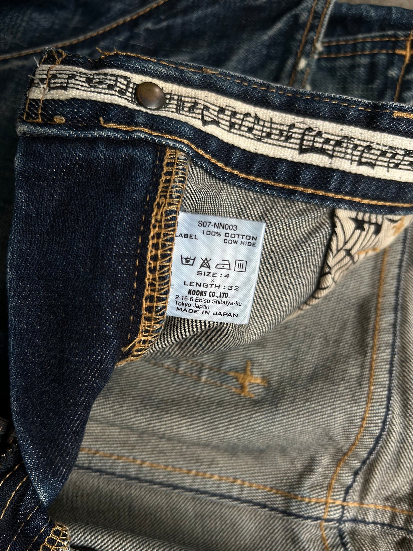 distressed washed denim pants by number nine