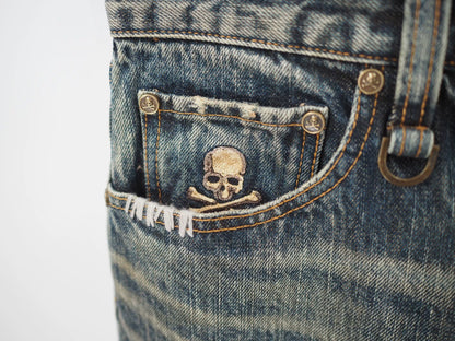 blue denim jeans with gold detail