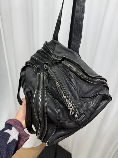large black zippered handbag