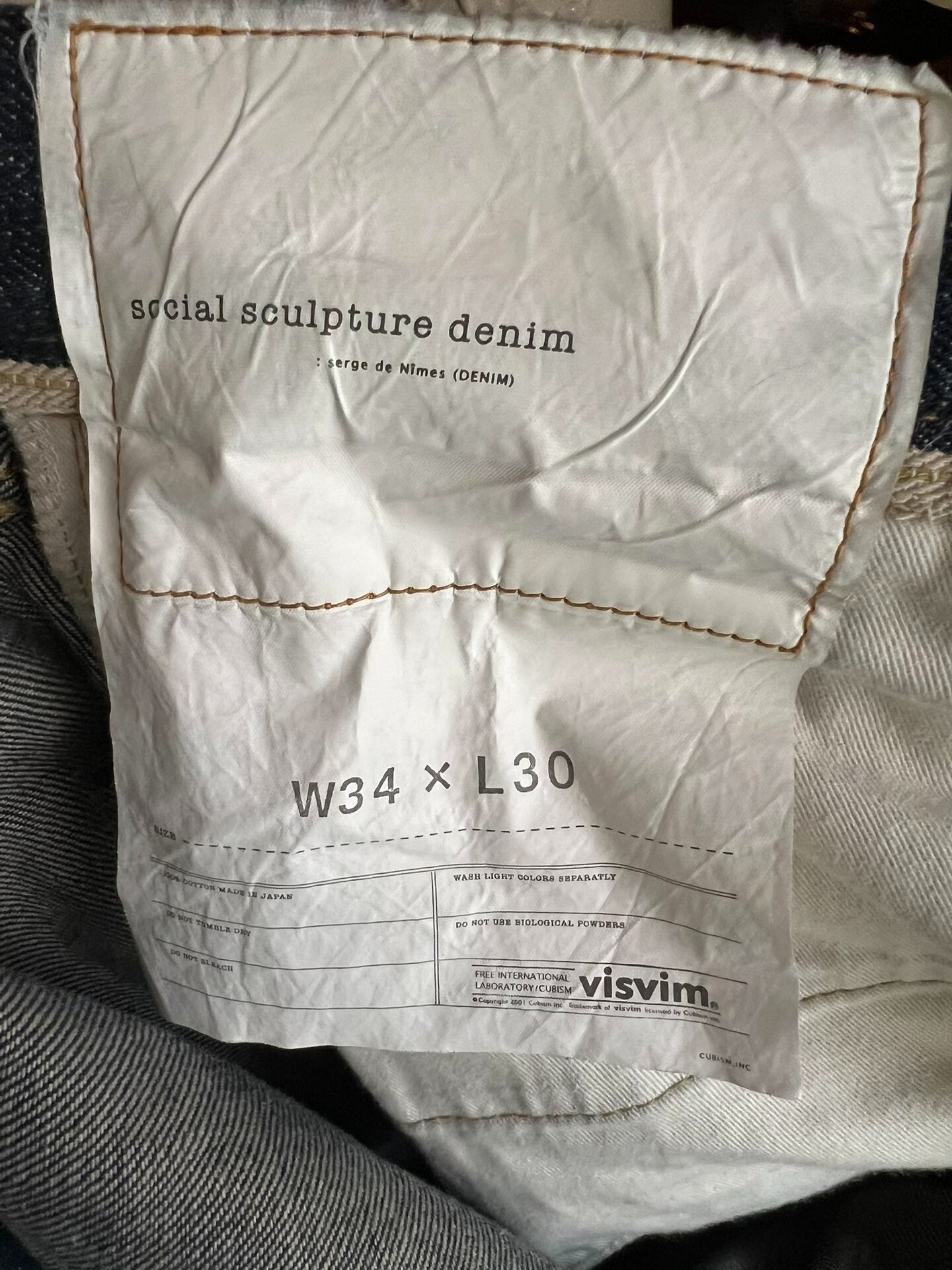 visvim red ear raw denim straight jeans