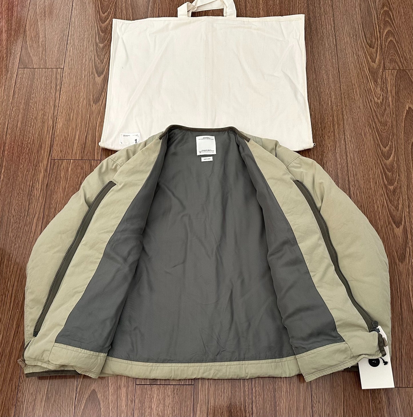 visvim harrier rig down jacket in beige