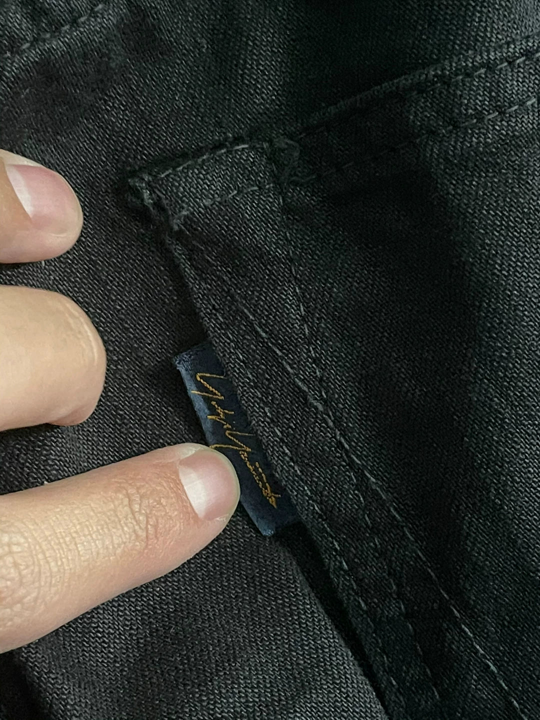 black denim pants with pocket detail