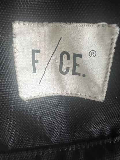 black roll-top backpack with multifunctional pockets