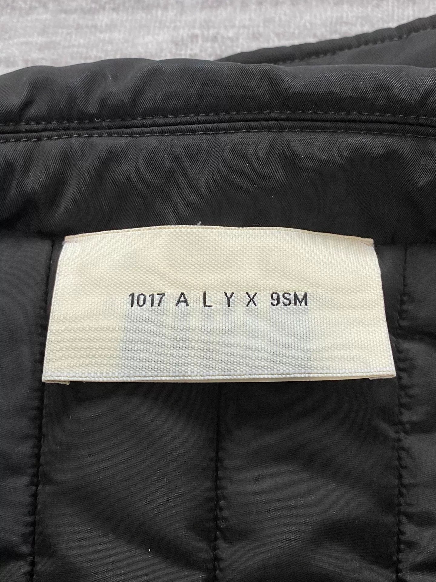 black bomber jacket with hidden pockets