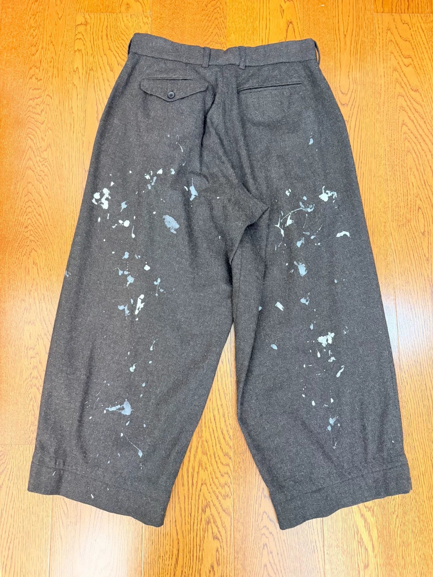kolor black wool pants with paint splatter