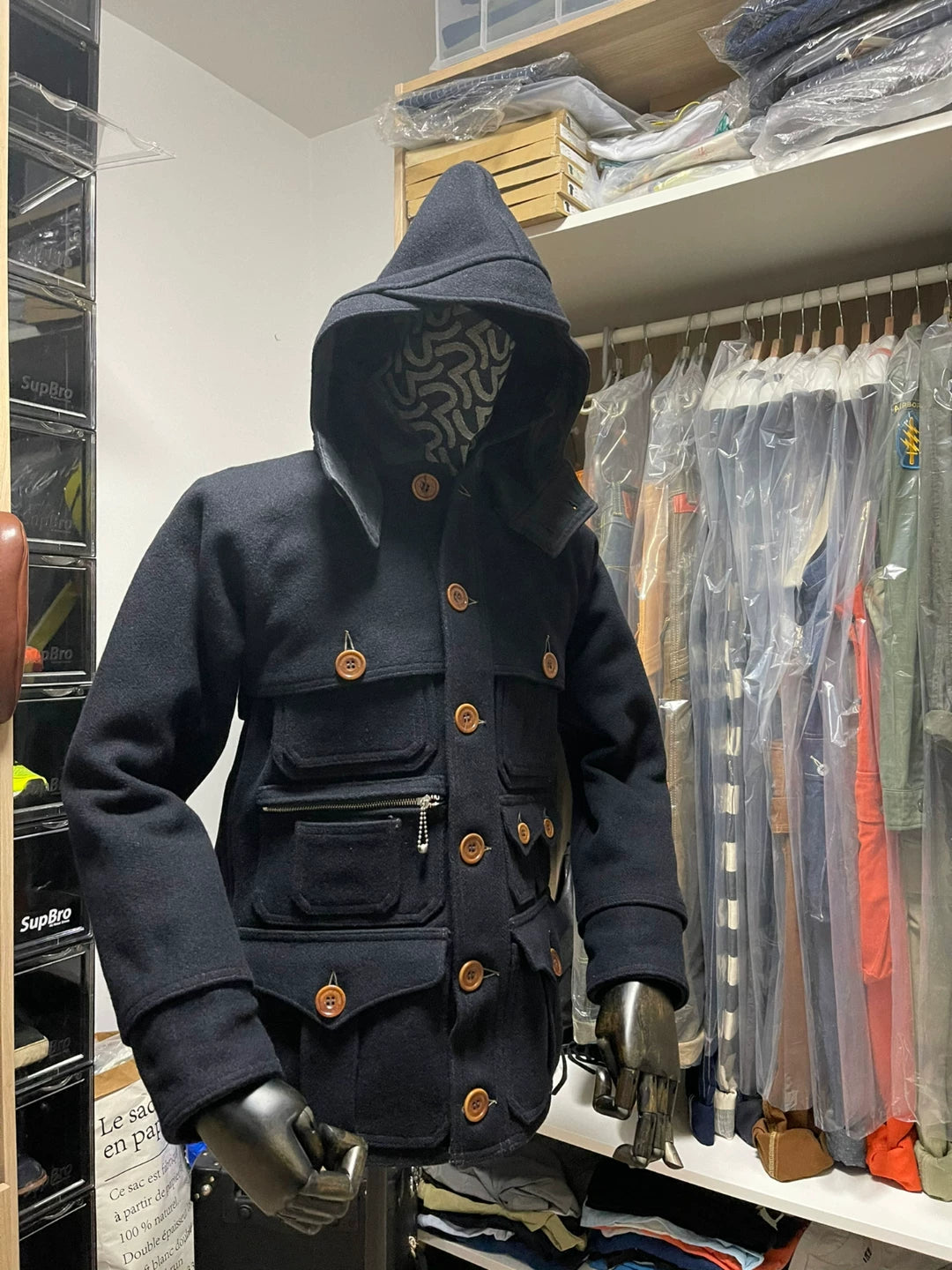 navy wool multi-pocket coat with detachable hood