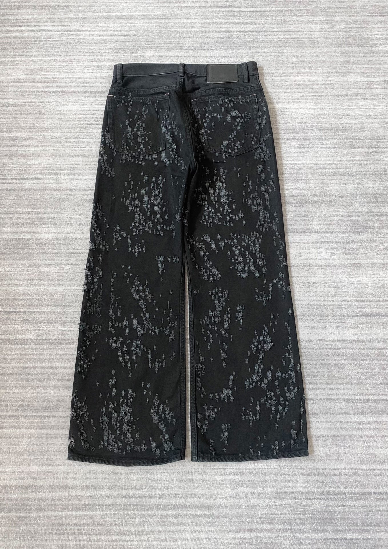Acne Studios Distressed Black Denim Flared Pants