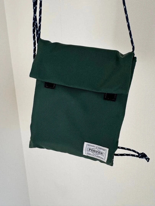 porter bamboo shoots small green bag