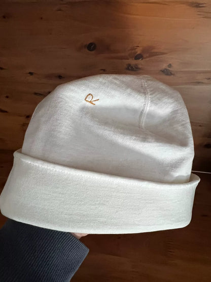 white knitted beanie with logo