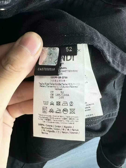 black denim jacket with logo patch