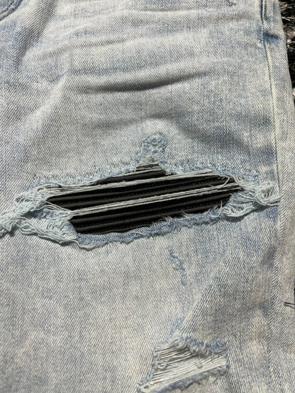 amiri mx1 distressed skinny jeans