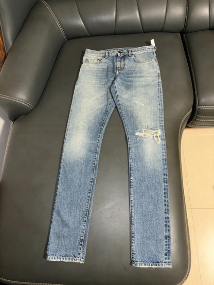 Saint Laurent Distressed Denim Jeans in Blue