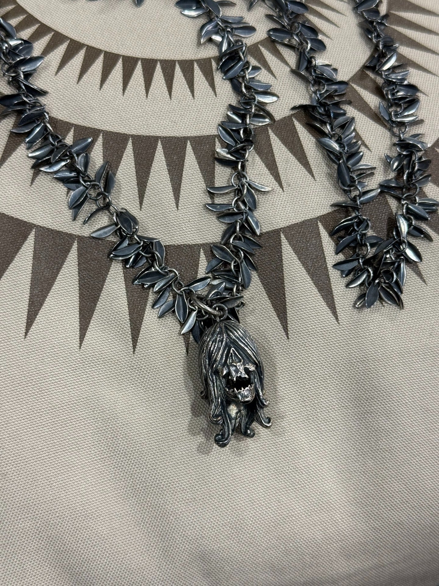 UNDERCOVER 06SS Ghost Head Bell Necklace